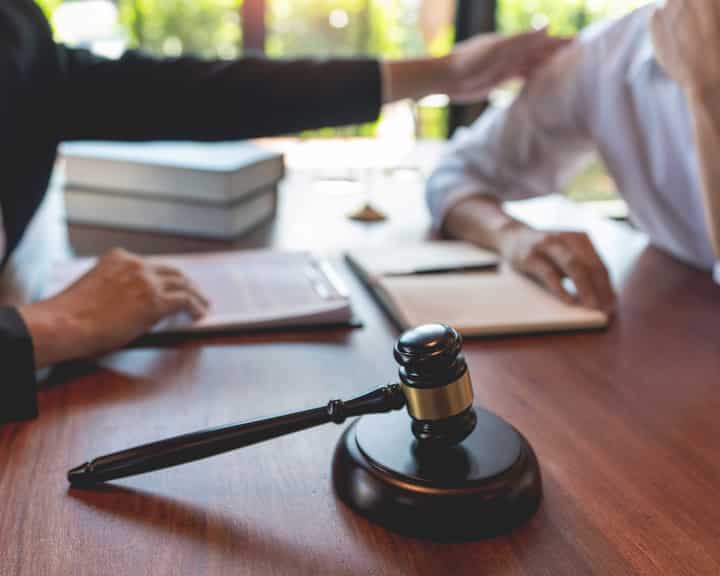 professional lawyer discussing legal options and solutions with a client in Virginia Beach